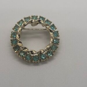 Vintage Gold Tone Circle Brooch Pin Aquamarine Blue Rhinestones Twisted Design